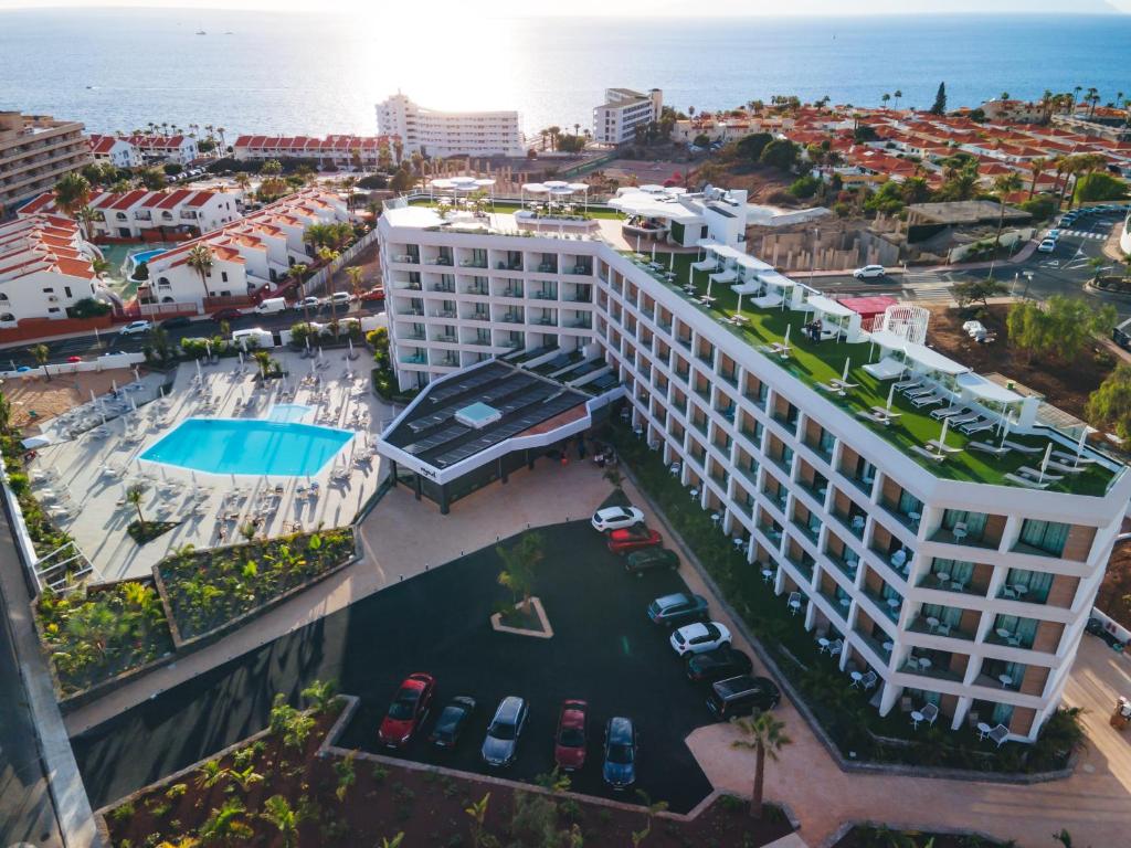 Aerial view of the hotel with pool, beach and ocean in Tenerife